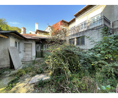 Casa la curte vizavi de Cismigiu