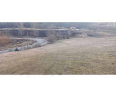 Teren Intravilan – Zonă Baraj Ighiș | 5.700 mp | Front Stradal Generos